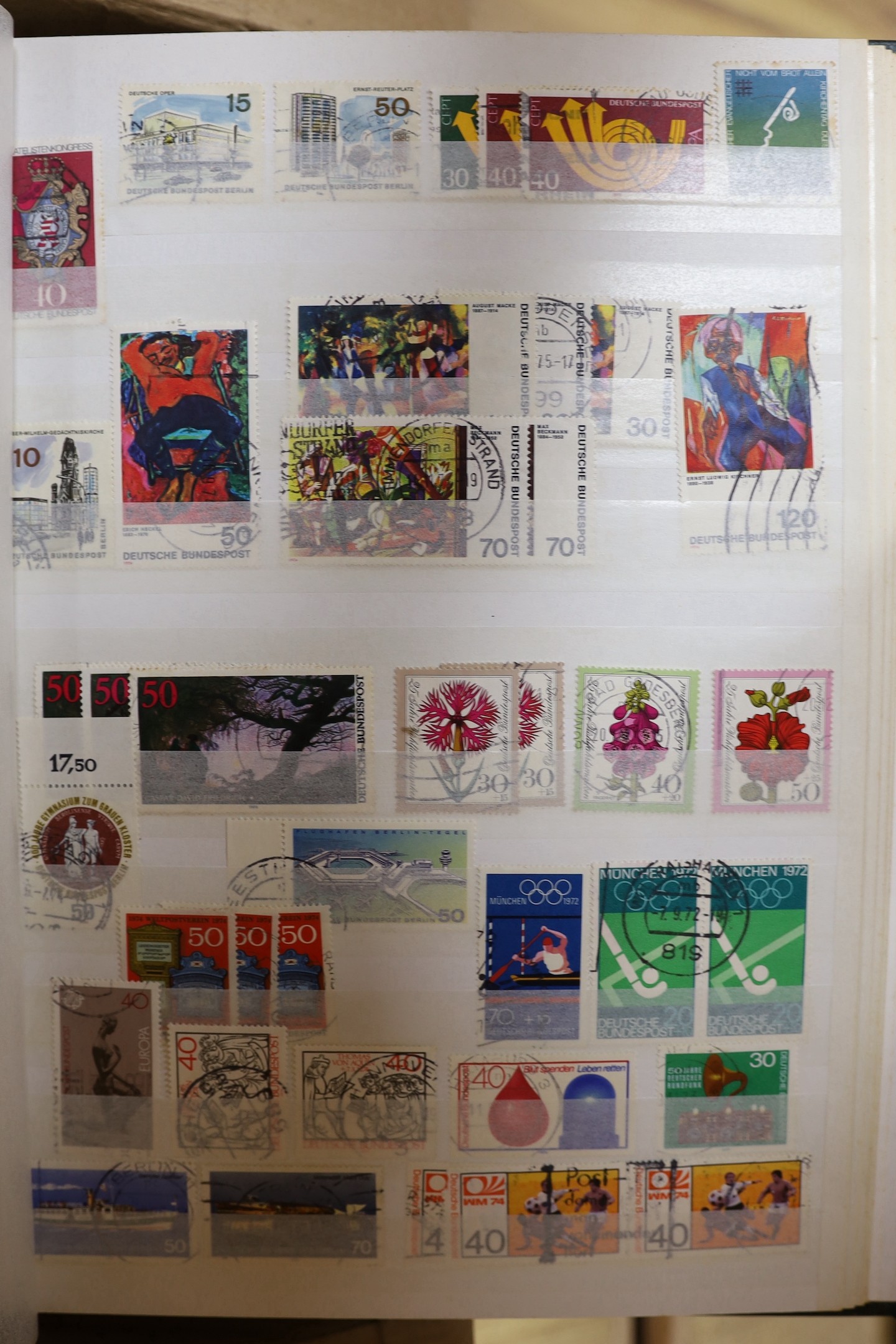 Four stock books of British stamps, QEII mint unused definitives and stamp books, some pre-decimal and two stock books of DDR used and mint unused stamps
